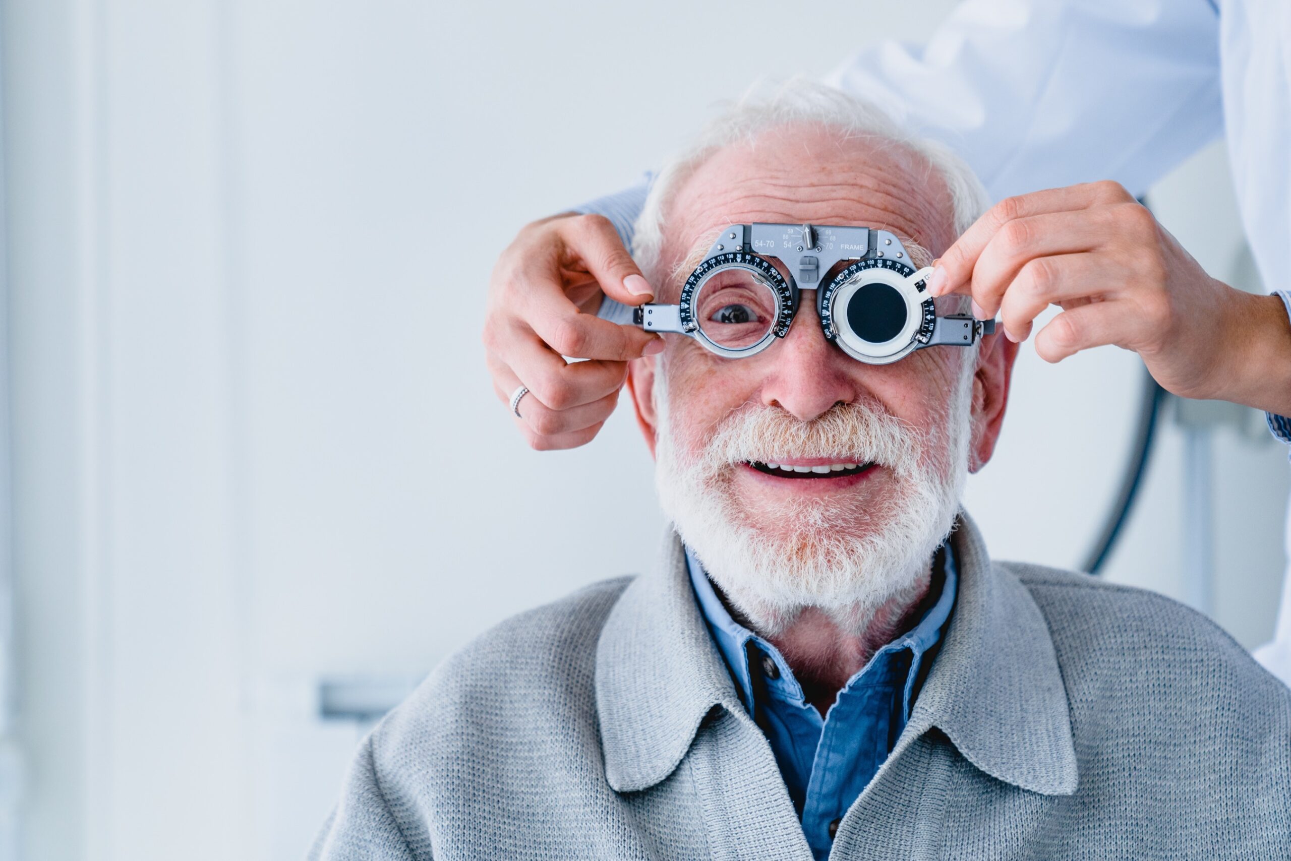 Man being fitted for eyeglasses